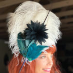 navy feathers Derby hat